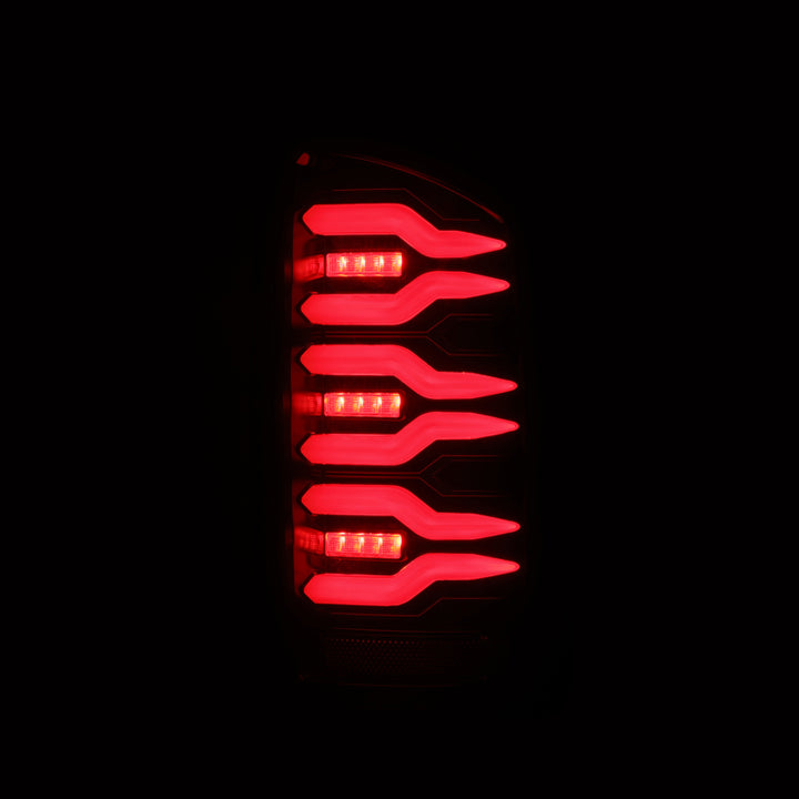 AlphaRex 02-06 Dodge Ram1500 + 03-06 Dodge Ram2500/3500 Luxx-Series LED Tail Lights (Pair) Black/Red - Bull Strap