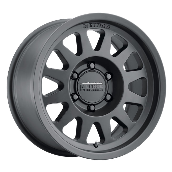 Method MR704 17x8.5 0mm Offset 5x5 71.5mm CB Matte Black Wheel - Bull Strap