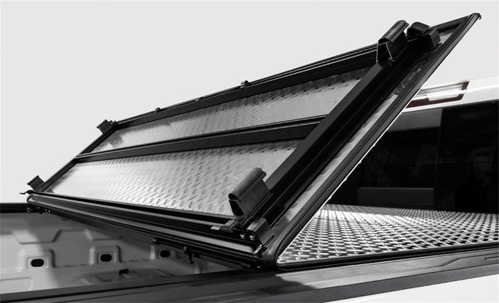 Access LOMAX Tri-Fold Cover Black Urethane Finish 04+ Ford F-150 - 5ft 6in Bed - Bull Strap