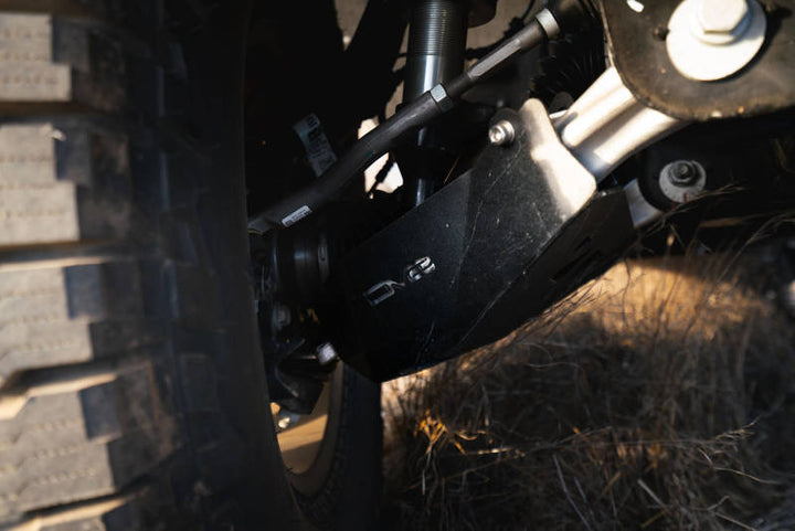 DV8 Offroad 21-22 Ford Bronco Front Lower Control Arm Skid Plate - Bull Strap