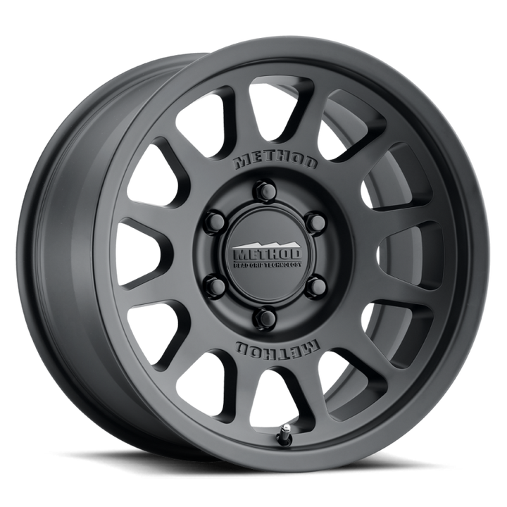 Method MR703 17x8.5 0mm Offset 6x135 87mm CB Matte Black Wheel - Bull Strap