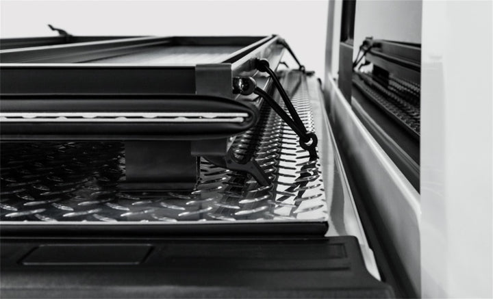 Access LOMAX Tri-Fold Cover Black Urethane Finish 04+ Ford F-150 - 5ft 6in Bed - Bull Strap