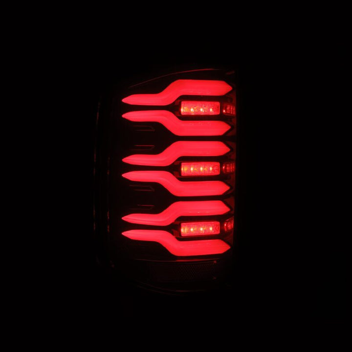 AlphaRex 14-18 Chevy Silverado 1500 Luxx-Series LED Tail Lights Black/Red w/Activ Light/Seq Signal - Bull Strap