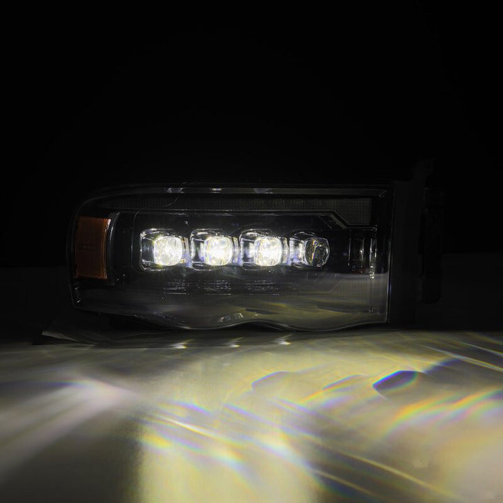 AlphaRex 02-05 Dodge Ram 1500 NOVA LED Proj Headlights Alpha Black w/Activ Light/Seq Signal - Bull Strap