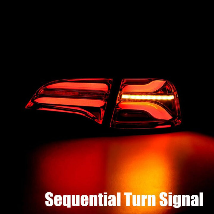 AlphaRex 20-22 Tesla Model Y PRO-Series LED Tail Lights Jet Black w/Seq Sig - Bull Strap