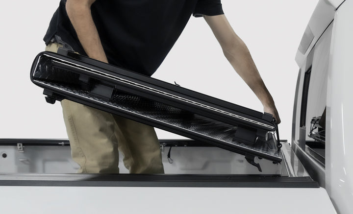 Access LOMAX Tri-Fold Cover Black Urethane Finish 04+ Ford F-150 - 5ft 6in Bed - Bull Strap