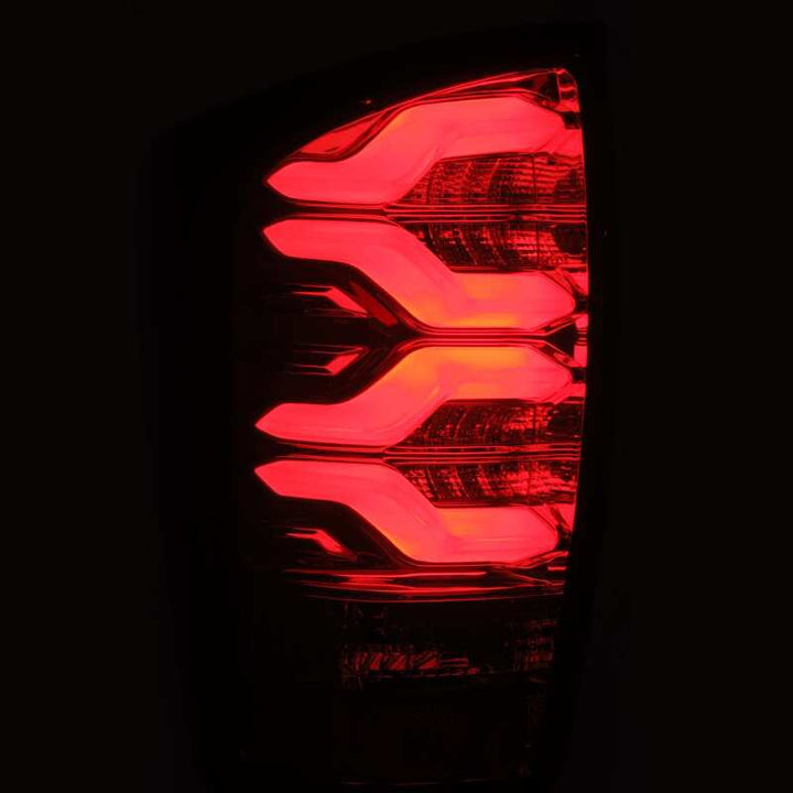 AlphaRex 16-21 Toyota Tacoma LUXX LED Taillights Blk/Red w/Activ Light/Seq Signal - Bull Strap