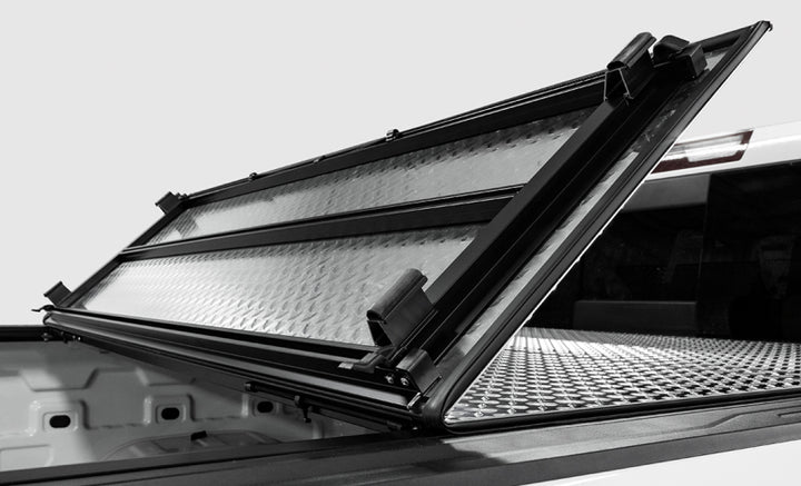 Access LOMAX Tri-Fold Cover Black Urethane Finish 04+ Ford F-150 - 5ft 6in Bed - Bull Strap