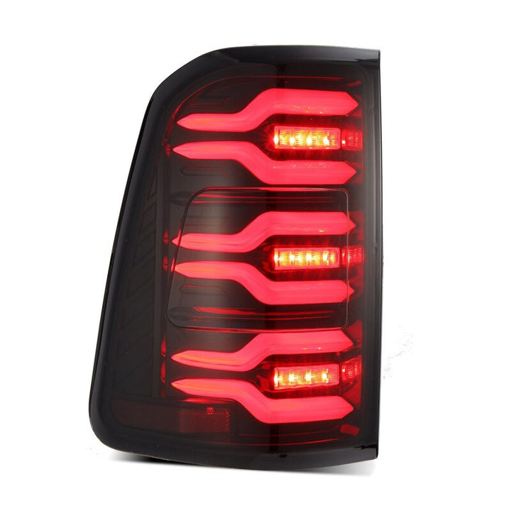 AlphaRex 19-21 Dodge Ram 1500 Luxx-Series LED Tail Lights Black/Red w/Activ Light/Seq Signal - Bull Strap