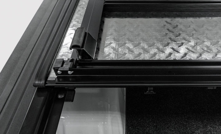 Access LOMAX Tri-Fold Cover Black Urethane Finish 04+ Ford F-150 - 5ft 6in Bed - Bull Strap