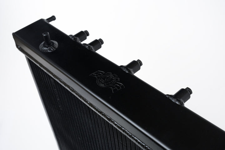 CSF 02-07 Subaru WRX/STI Radiator - Black Finish - Bull Strap
