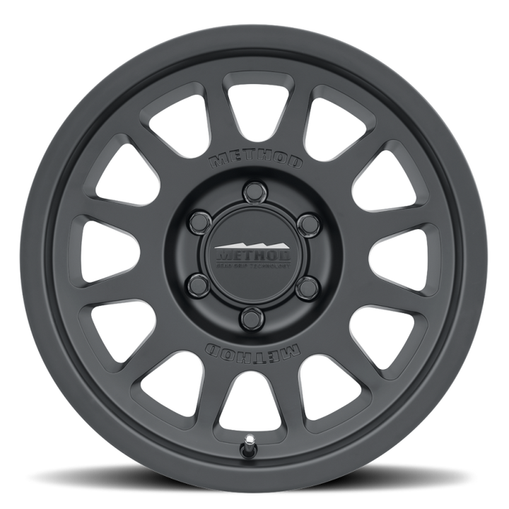 Method MR703 17x8.5 0mm Offset 6x135 87mm CB Matte Black Wheel - Bull Strap
