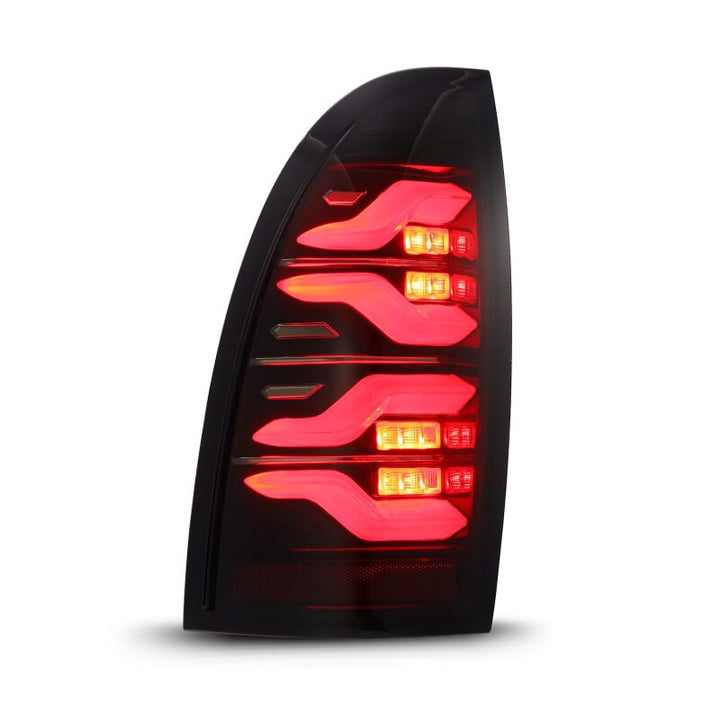 AlphaRex 05-15 Toyota Tacoma LUXX LED Taillights Blk/Red w/Activ Light/Seq Signal - Bull Strap