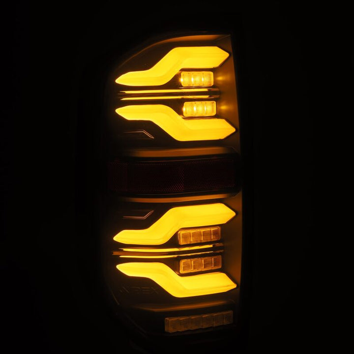 AlphaRex 14-21 Toyota Tundra LUXX LED Taillights Alpha Blk w/Activ Light/Seq Signal - Bull Strap