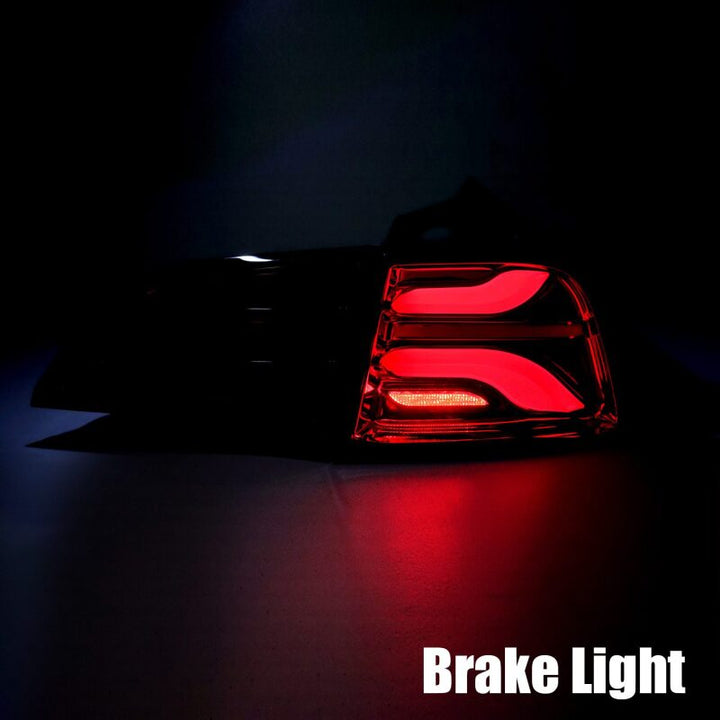 AlphaRex 20-22 Tesla Model Y PRO-Series LED Tail Lights Jet Black w/Seq Sig - Bull Strap