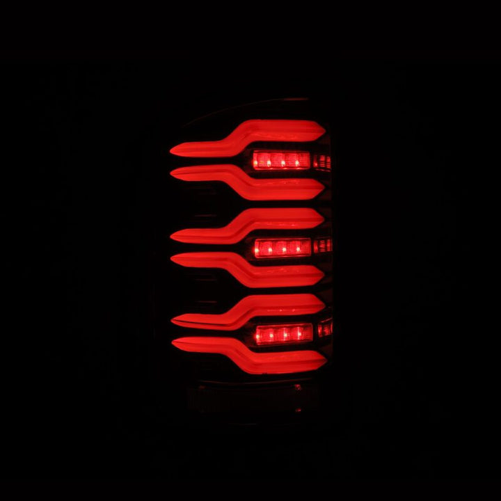 AlphaRex 14-18 GMC Sierra 1500/2500HD/3500HD LUXX-Series LED Tail Lights Alpha-Blk Actv Lgt Seq. Sig - Bull Strap