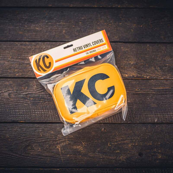 KC HiLiTES Retro 5in x 7in Rectangular Yellow Vinyl Light Cover w/ Black KC Logo (Pair) - Bull Strap