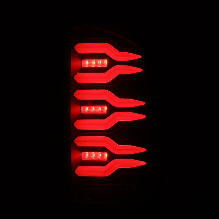 AlphaRex 02-06 Dodge Ram 1500/03-06 Dodge Ram 2500+3500 Luxx-Series LED Tail Lights (Pair) Black - Bull Strap