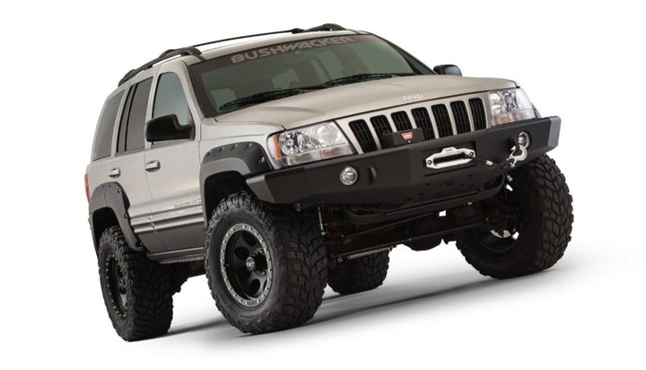 Bushwacker 99-04 Jeep Grand Cherokee Cutout Style Flares 4pc - Black - Bull Strap