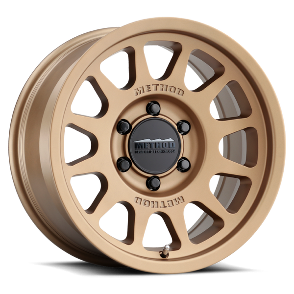 Method MR703 17x8.5 0mm Offset 6x5.5 106.25mm CB Method Bronze Wheel - Bull Strap