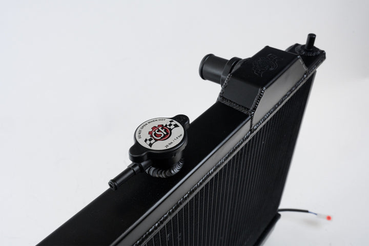 CSF 96-07 Mitsubishi Evo 4/5/6/7/8/9 Full-Slim Radiator w/12in Fan & Shroud/-16AN - Black - Bull Strap