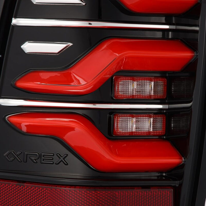 AlphaRex 05-15 Toyota Tacoma LUXX LED Taillights Blk/Red w/Activ Light/Seq Signal - Bull Strap