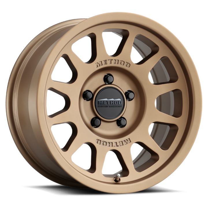 Method MR703 17x8.5 0mm Offset 5x5 71.5mm CB Method Bronze Wheel - Bull Strap