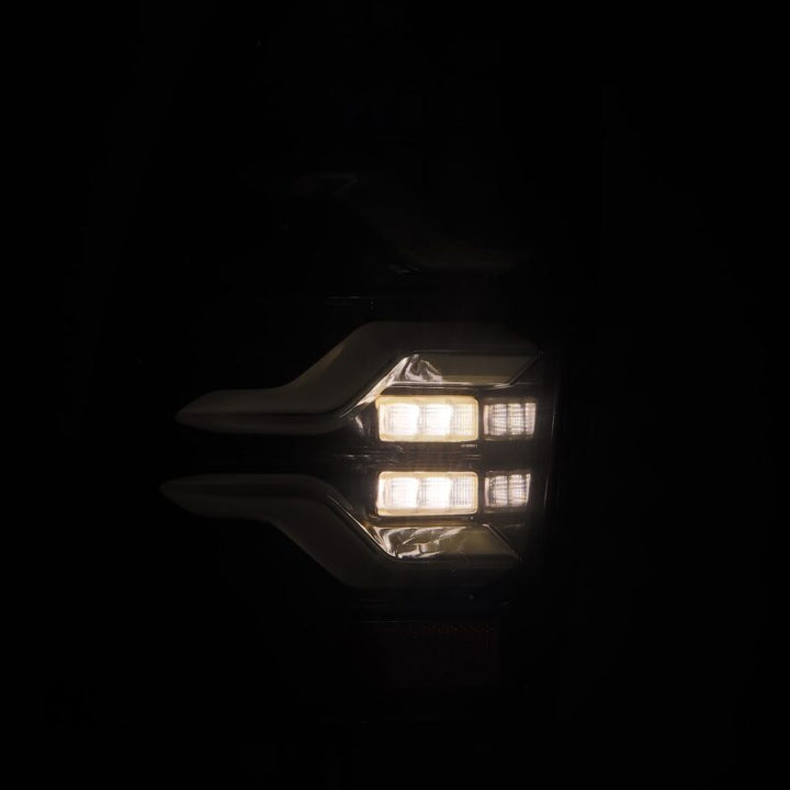 AlphaRex 05-15 Toyota Tacoma LUXX LED Taillights Alpha Blk w/Activ Light/Seq Signal - Bull Strap