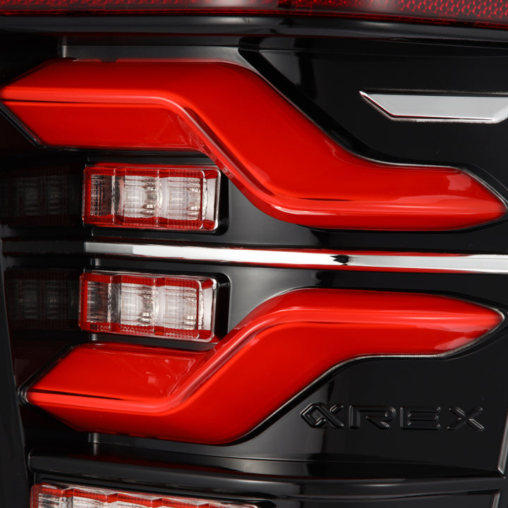 AlphaRex 16-21 Toyota Tacoma LUXX LED Taillights Blk/Red w/Activ Light/Seq Signal - Bull Strap