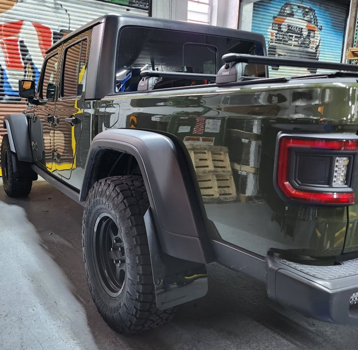 Rally Armor 19-25 Jeep JT Gladiator (Mojave/Rubicon) Black Mud Flap w/Grey Logo - Bull Strap