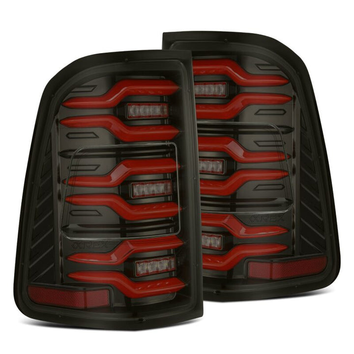 AlphaRex 19-21 Dodge Ram 1500 Luxx-Series LED Tail Lights Black/Red w/Activ Light/Seq Signal - Bull Strap