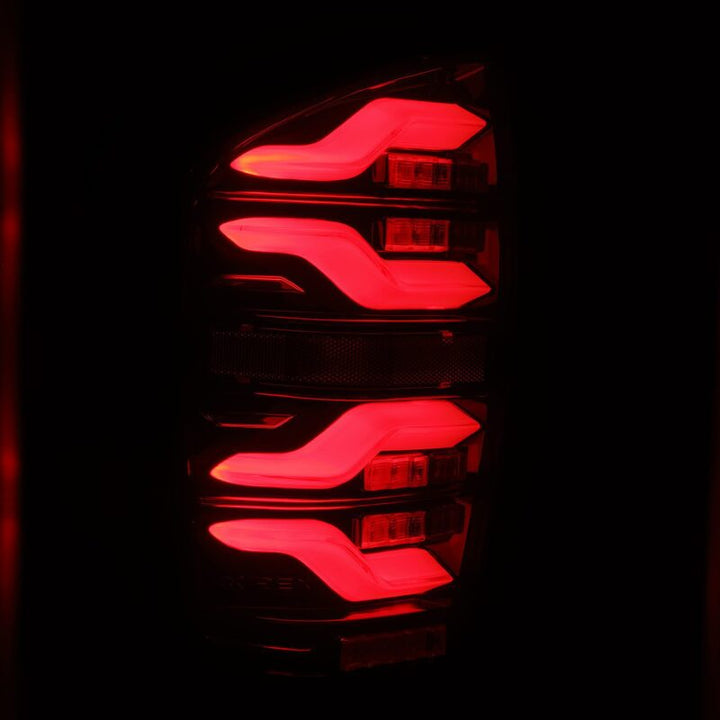AlphaRex 16-21 Toyota Tacoma LUXX LED Taillights Blk/Red w/Activ Light/Seq Signal - Bull Strap