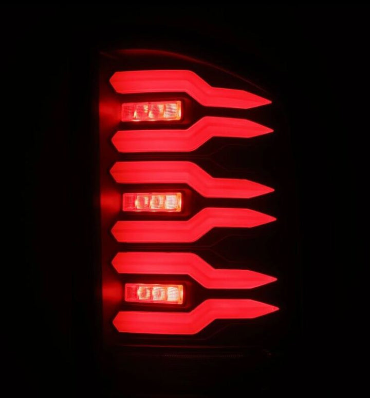 AlphaRex 07-14 Chevrolet Silverado 1500/2500HD/3500HD Luxx-Series LED Tail Lights Blk w/Smoked Lens - Bull Strap