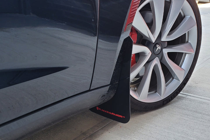 Rally Armor 17-23 Tesla Model 3 Black UR Mud Flap - Metallic Black Logo - Bull Strap
