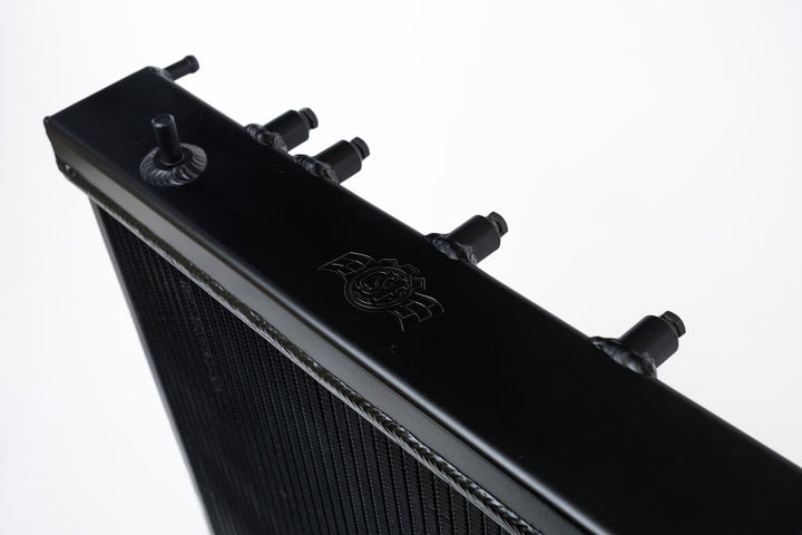 CSF 02-07 Subaru WRX/STI Radiator - Black Finish - Bull Strap