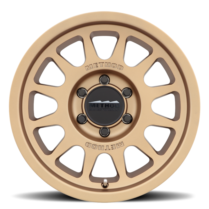 Method MR703 17x8.5 0mm Offset 6x5.5 106.25mm CB Method Bronze Wheel - Bull Strap