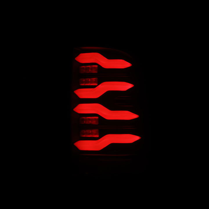 AlphaRex 09-18 Dodge Ram Luxx-Series LED Tail Lights Alpha-Black w/ Activation Light & Seq. Signal - Bull Strap
