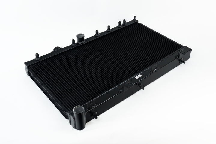 CSF 02-07 Subaru WRX/STI Radiator - Black Finish - Bull Strap