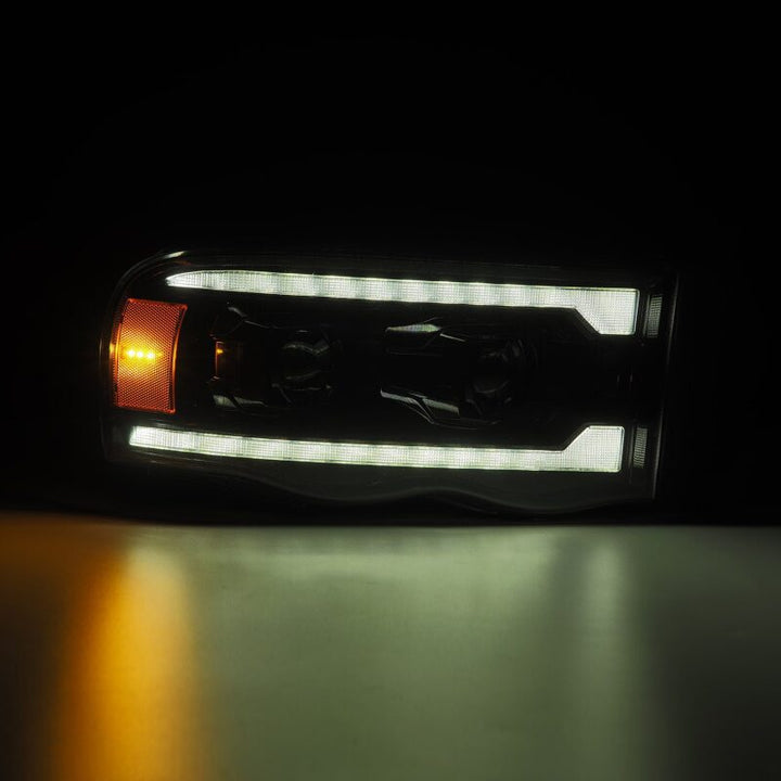 AlphaRex 02-05 Dodge Ram 1500 LUXX LED Proj Headlights Alpha Black w/Activ Light/Seq Signal - Bull Strap