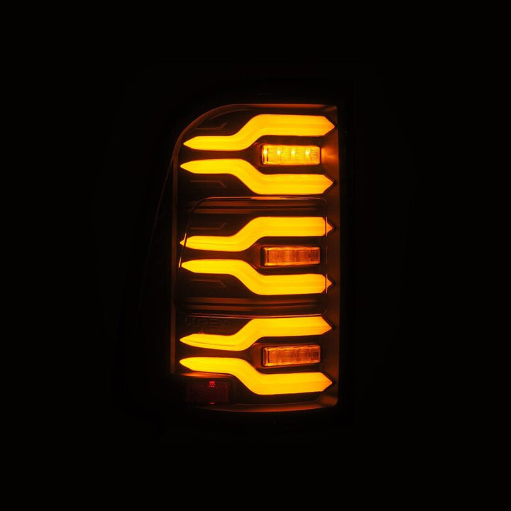AlphaRex 19-21 Dodge Ram 1500 Luxx-Series LED Tail Lights Black w/Activ Light/Seq Signal - Bull Strap