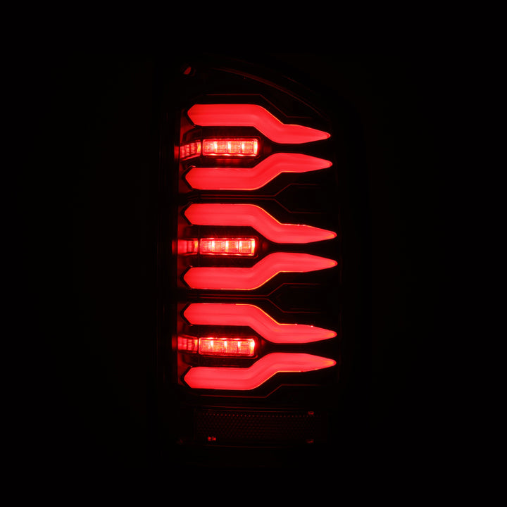 AlphaRex 02-06 Dodge Ram1500/03-06 Dodge Ram 2500/3500 Truck LUXX-Series LED Tail Lights Alpha-Black - Bull Strap