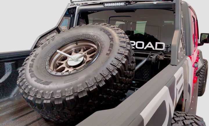 DV8 Offroad 2019+ Jeep Gladiator In-Bed Adjustable Tire Carrier - Bull Strap