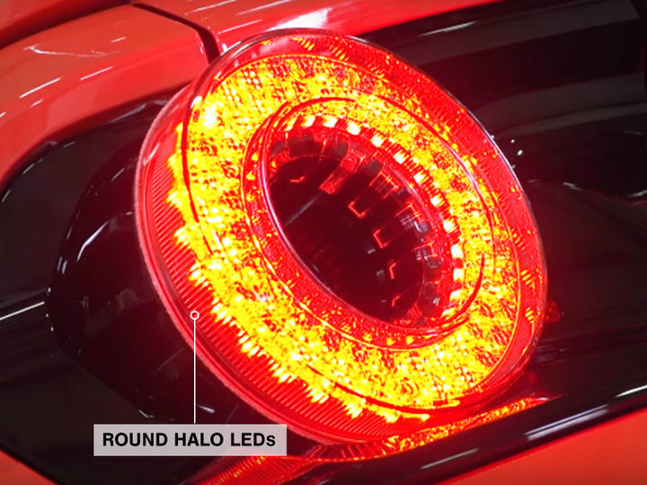 Raxiom 15-22 Ford Mustang Halo LED Tail Lights - Gloss Black Housing (Smoked Lens) - Bull Strap