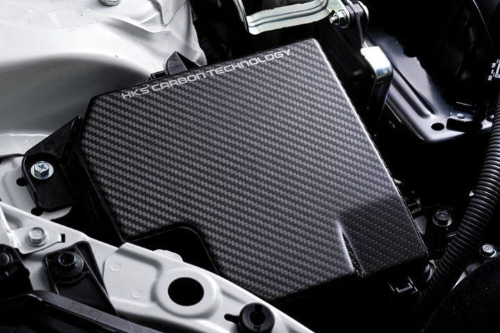 HKS DryCarbon Fuse Box Cover GR86/BRZ - Bull Strap