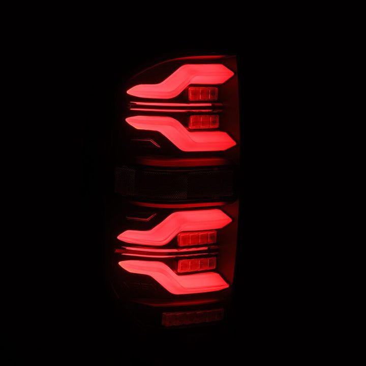 AlphaRex 14-21 Toyota Tundra LUXX LED Taillights Alpha Blk w/Activ Light/Seq Signal - Bull Strap