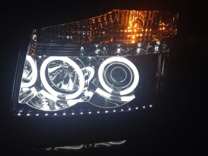 Spyder Nissan Titan 04-14/Armada 04-07 Projector Headlights CCFL Halo LED Blk PRO-YD-NTI04-CCFL-BK - Bull Strap