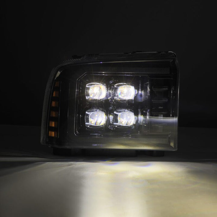 AlphaRex 05-07 Ford Super Duty/Excursion NOVA-Series LED Projector Headlights Alpha-Blk w/Activ Ligh - Bull Strap
