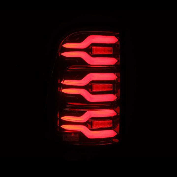 AlphaRex 19-21 Dodge Ram 1500 Luxx-Series LED Tail Lights Black/Red w/Activ Light/Seq Signal - Bull Strap