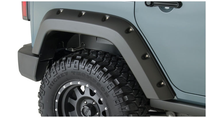 Bushwacker 07-18 Jeep Wrangler Unlimited Pocket Style Flares 2pc 4-Door Sport Utility Only - Black - Bull Strap