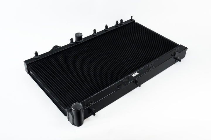 CSF 02-07 Subaru WRX/STI Radiator - Black Finish - Bull Strap